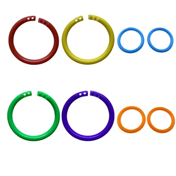 соедините незакрепленные предметы с помощью колец для скрепления вкладышей - Гибкие пластиковые кольца для карточек синего цвета диаметром 27 мм - Изображение 1  